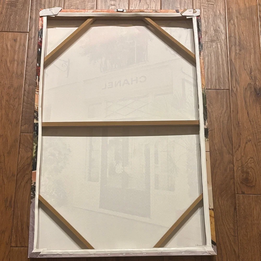 CHANEL Elegant Storefront Canvas with Green and Black Accents
